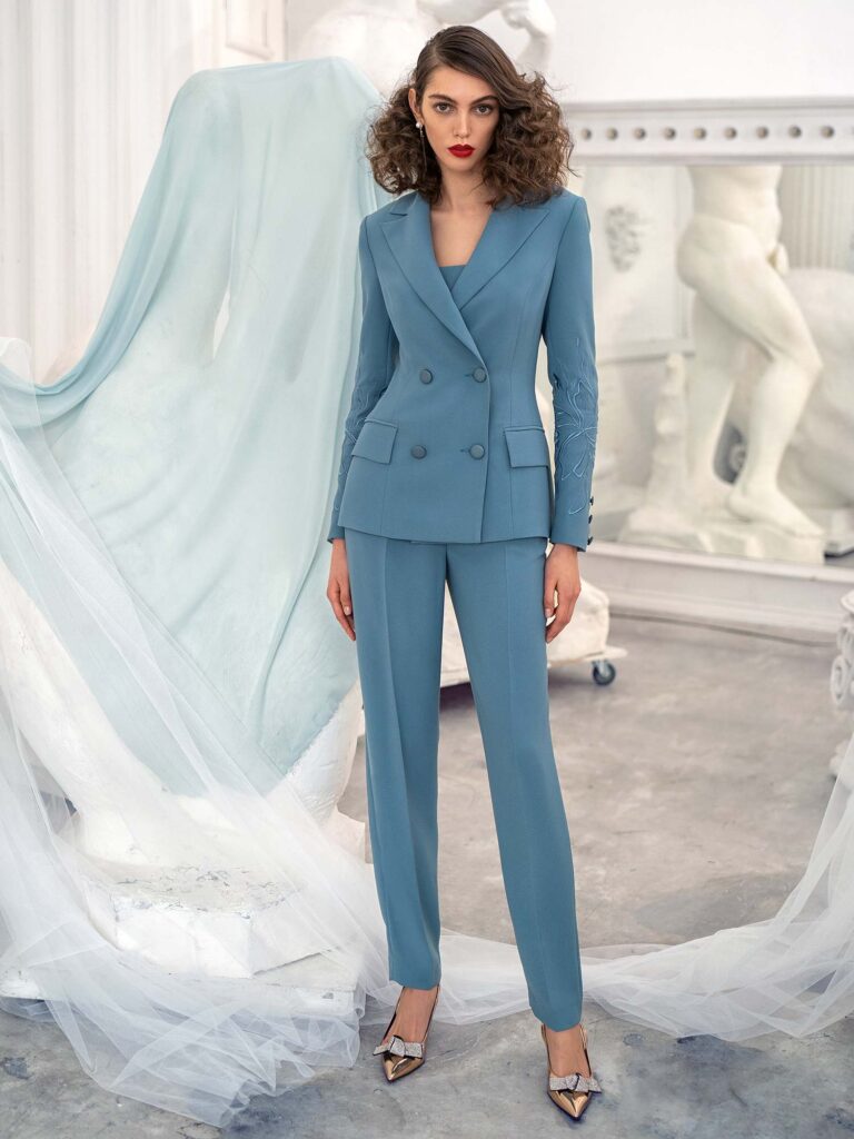 Style #671, three-piece pantsuit with top and jacket; available in turquoise, lilac-brown, dark blue, black, pink, red
