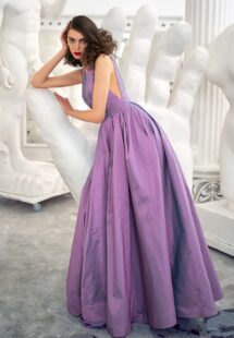 Style #673b, taffeta A-line gown with deep V-neckline and open back; available in midi or maxi length; in gold-grey, gold-orange, orange, purple, fenny, coral, pistachio-coloured, ivory
