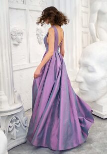 Style #673b, taffeta A-line gown with deep V-neckline and open back; available in midi or maxi length; in gold-grey, gold-orange, orange, purple, fenny, coral, ivory