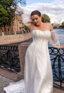 Style #2243L, Sparkling fit and flare plus size wedding dress with detachable balloon sleeves; available in ivory