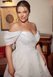 Style #2245L, Textured organza plus size ball gown with off the shoulders sleeves; available in ivory