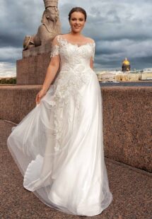 Style #2247L, Short sleeve plus size A-line wedding dress with lace décor; available in ivory