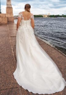 Style #2247L, Short sleeve plus size A-line wedding dress with lace décor; available in ivory