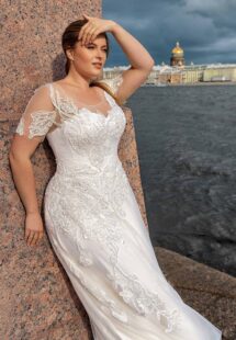 Style #2247L, Short sleeve plus size A-line wedding dress with lace décor; available in ivory