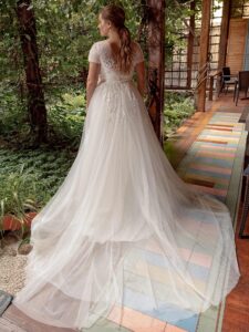 A-line plus size wedding dress with off the shoulder sleeves; available in ivory, white