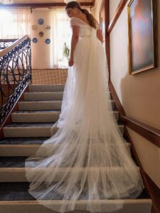 A-line plus size wedding dress with pearl décor and off the shoulder neckline