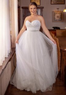 Style #2251, Strapless allover sequin plus size ball gown; available in ivory