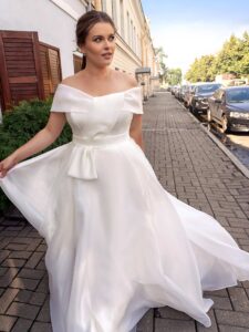 Simple plus size A-line wedding dress with off the shoulder neckline