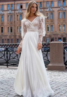 Style #14002, Long sleeve wedding dress with a flowy skirt; available in ivory-nude, ivory