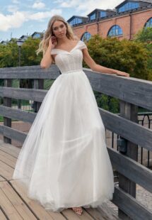 Style #14012, Ballgown wedding dress with an off-the-shoulder neckline and pearl decor; available in ivory