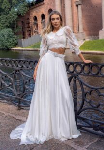 Styles #14013-3 and 14013-2, Two-piece bridal set with lace long-sleeve crop top and flowy chiffon skirt; available in ivory