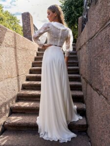 Two-piece bridal set with lace long-sleeve crop top and flowy chiffon skirt