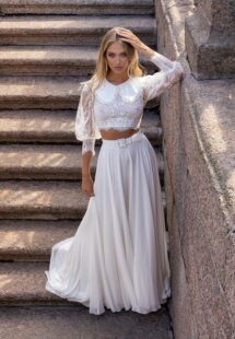 Styles #14013-3 and 14013-2, Two-piece bridal set with lace long-sleeve crop top and flowy chiffon skirt; available in ivory