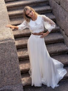 Two-piece bridal set with lace long-sleeve crop top and flowy chiffon skirt