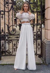Styles #14013-3 and 14013-4, Two-piece bridal set with a lace crop top and chiffon palazzo pants; available in ivory
