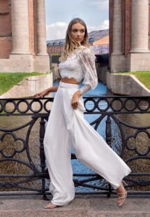 Styles #14013-3 and 14013-4, Two-piece bridal set with a lace crop top and chiffon palazzo pants; available in ivory