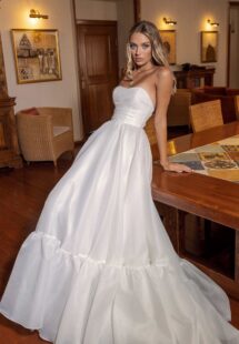 Style #14015, Strapless A-line wedding dress with detachable off-the-shoulder capelet; available in ivory