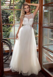 Style #14016, A-line tulle wedding dress with embroidered top; available in ivory