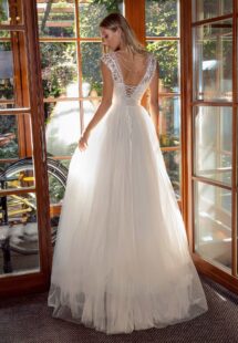 Style #14016, A-line tulle wedding dress with embroidered top; available in ivory