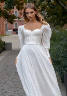 Style #14017, Long-sleeve sheath wedding dress with bustier style corset; available in ivory