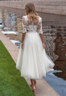 Styles #14019-3 and 14019-2a, Lace bridal crop top with a tulle tea-length skirt; available in ivory