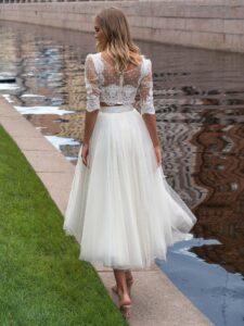 Lace bridal crop top with a tulle tea-length skirt