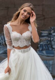 Styles #14019-3 and 14019-2a, Lace bridal crop top with a tulle tea-length skirt; available in ivory