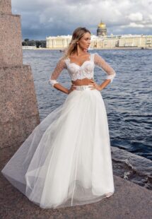 Styles #14019-3 and 14019-2b, Two-piece bridal set with a lace crop top and tulle skirt; available in ivory