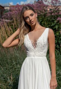 Style #14020, Chiffon sheath wedding dress with plunging neckline; available in ivory