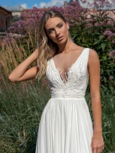 Chiffon sheath wedding dress with plunging neckline