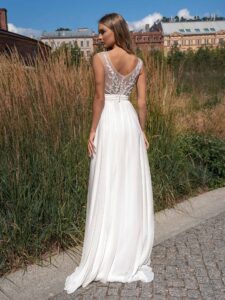Chiffon sheath wedding dress with plunging neckline