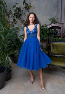 Style #716a, full skirt evening dress with floral V-neck bodice; comes with a detachable long-sleeve tulle overlay blouse; available in midi or maxi length; in cornflower, green-yellow, crimson, powder, blue, pink, cherry, black, ivory