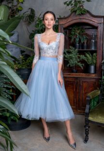 Style #725a, two-piece 3/4 sleeve crop top and midi tulle skirt set; available in blue, black, ivory