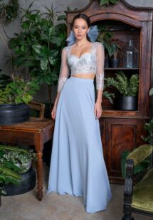 Style #725b, two-piece 3/4 sleeve crop top and long chiffon skirt set; available in blue, black, ivory