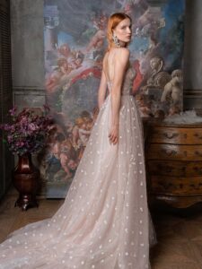 Pale blush A-line wedding dress with bustier style corset and 3D flower embroidery; available in ivory-powder, ivory