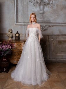 Shimmering tulle ballgown wedding dress with off-the-shoulder straps and floral 3D embroidery