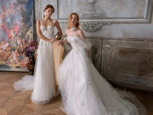 Shimmering tulle ballgown wedding dress with off-the-shoulder straps and floral 3D embroidery | A-line wedding dress with thick straps, plunging bustier-style bodice and floral applique