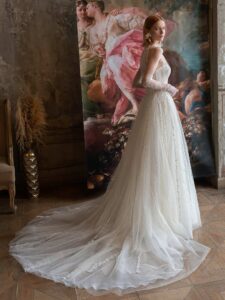 Vertical stripe lace A-line wedding dress with illusion halter neckline over a bustier style corset
