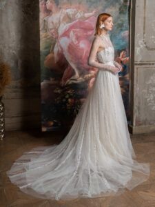 Vertical stripe lace A-line wedding dress with illusion halter neckline over a bustier style corset