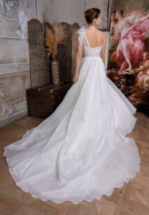 Style #2305L, one-shoulder ballgown wedding dress with lace bodice and organza slit skirt; available in ivory