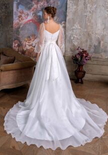 Style #2310L, square neck A-line wedding dress with floral long-sleeve bodice and organza skirt; available in ivory