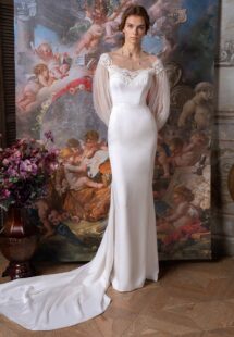 Style #2312L, long sleeve fit and flare wedding dress with an illusion off-the-shoulder lace neckline; available in ivory