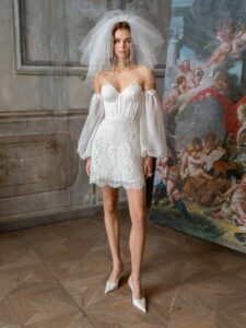 Mini wedding dress with detachable balloon sleeves; available in cream