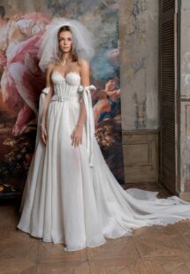 Style #2313L, mini wedding dress with a detachable A-line skirt; available in cream