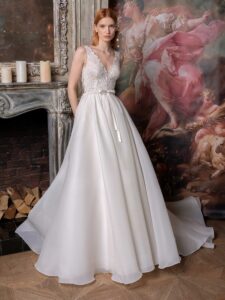 Open back A-line wedding dress with V-neck floral bodice and plain organza skirt