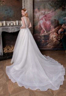 Style #2316L, open back A-line wedding dress with V-neck floral bodice and plain organza skirt; available in ivory