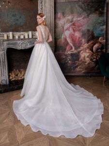 Open back A-line wedding dress with V-neck floral bodice and plain organza skirt