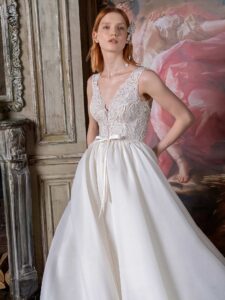 Open back A-line wedding dress with V-neck floral bodice and plain organza skirt