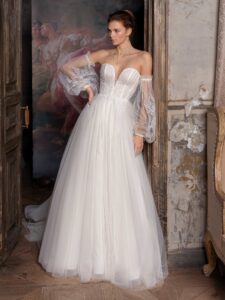 Strapless ballgown wedding dress with plunging V-neckline, floral applique and detachable bishop sleeves