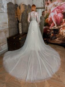 High-neck A-line wedding dress with long sleeves and floral embroidery; available in mint-powder, ivory